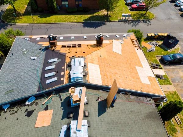 Understanding Roofing Warranties: A Guide from Replacement Contractors